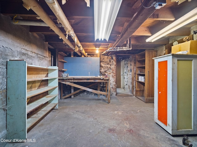 basement with a workshop area