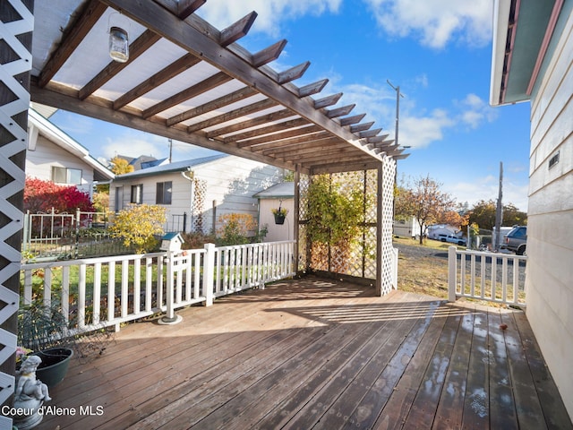 wooden terrace featuring a pergola