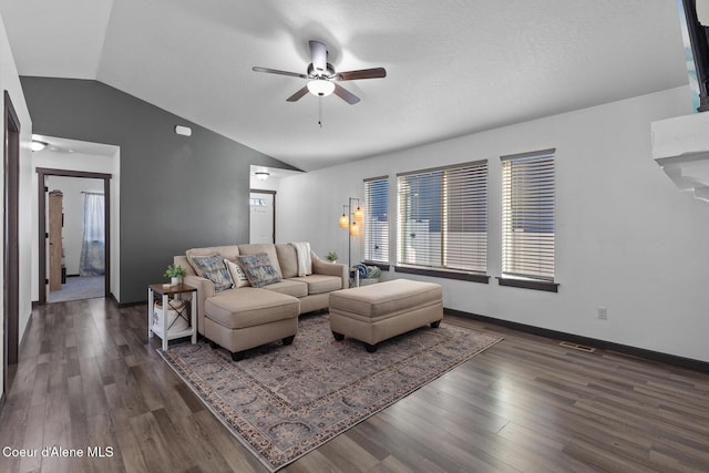 living room with dark wood-type flooring, vaulted ceiling, and ceiling fan