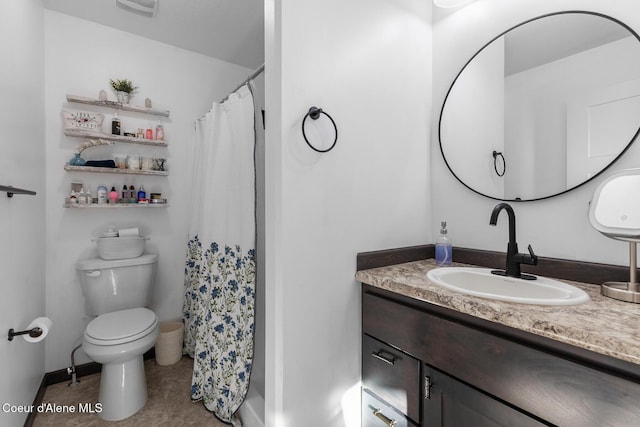 bathroom with vanity, tile patterned flooring, toilet, and a shower with shower curtain