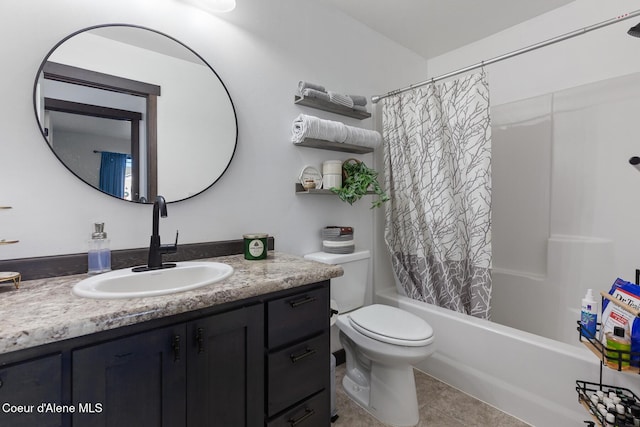 full bathroom with vanity, toilet, tile patterned flooring, and shower / tub combo