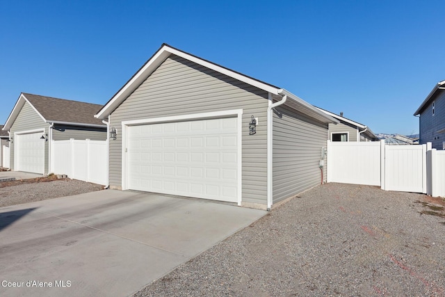 view of property exterior featuring a garage