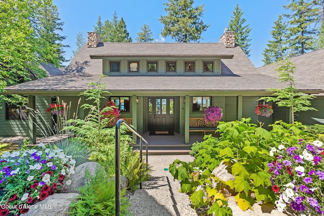 view of front of property featuring covered porch