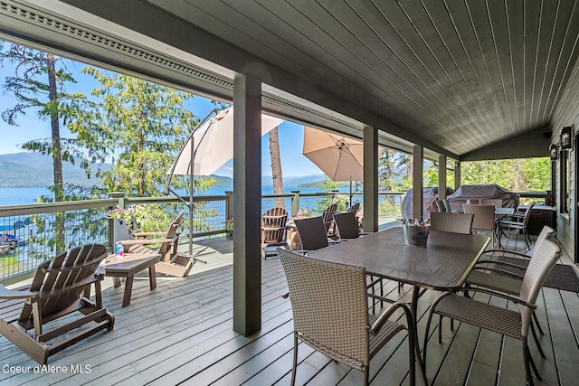 deck featuring a water and mountain view