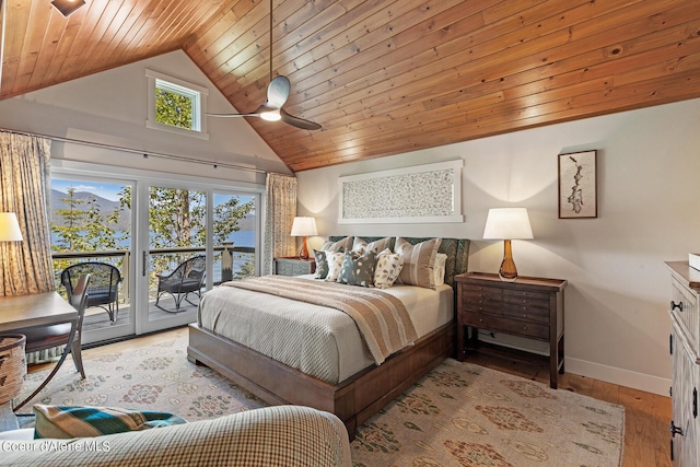 bedroom with ceiling fan, lofted ceiling, access to outside, light hardwood / wood-style flooring, and wood ceiling