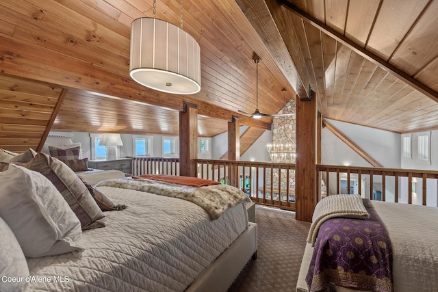 bedroom with carpet floors, vaulted ceiling, and wood ceiling