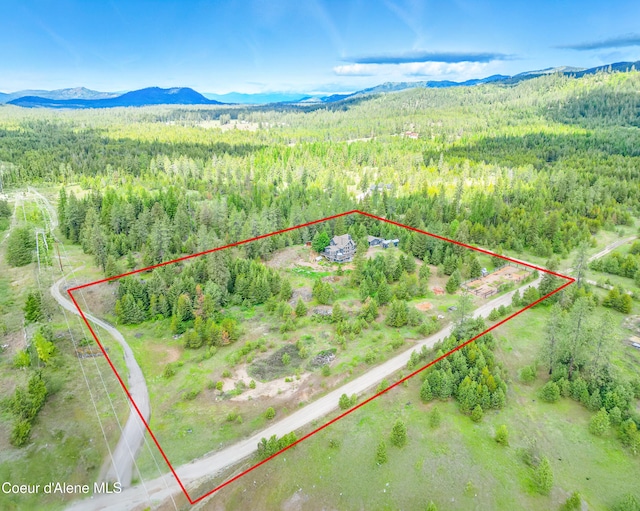 32 Angelina Way, Priest River, ID 83856 - view of property location featuring mountains, property parcel outlined, and a forest