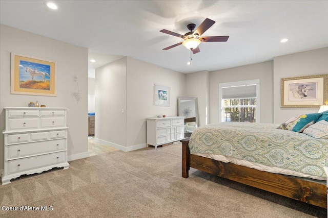 bedroom featuring a ceiling fan, recessed lighting, light colored carpet, and baseboards