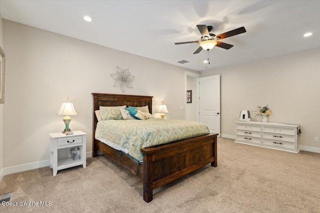 bedroom featuring recessed lighting, light carpet, visible vents, a ceiling fan, and baseboards