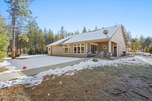 back of property featuring a patio area