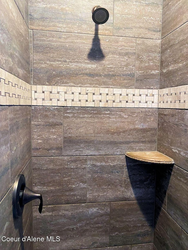 details featuring a tile shower