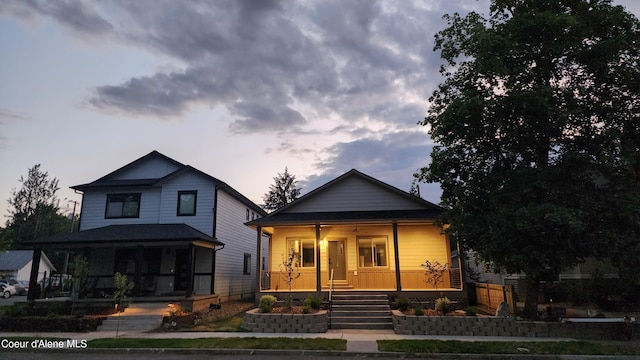 view of front of property featuring covered porch