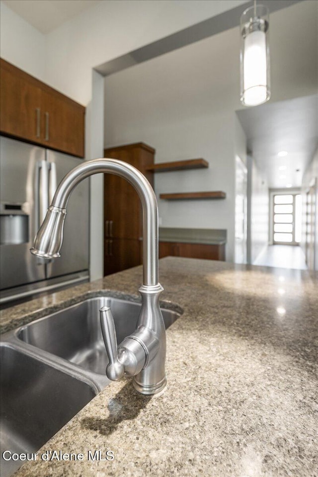 details with sink and stone countertops