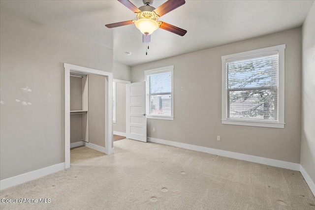 unfurnished bedroom with a closet and ceiling fan