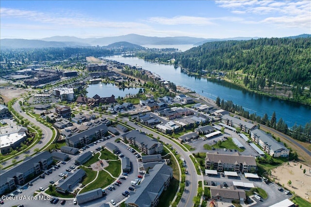 bird's eye view featuring a water and mountain view