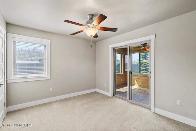 empty room featuring light carpet