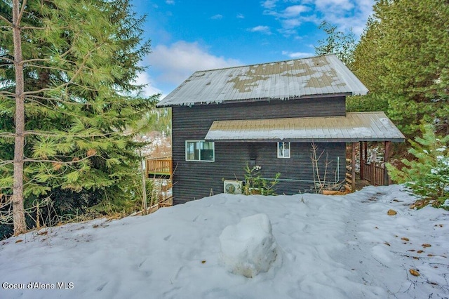 view of snow covered property