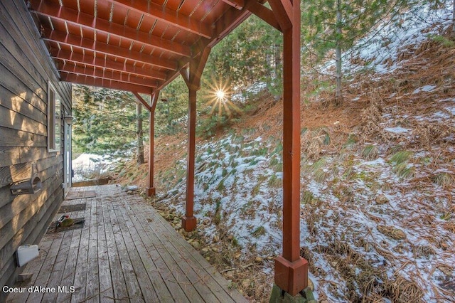 view of snow covered deck