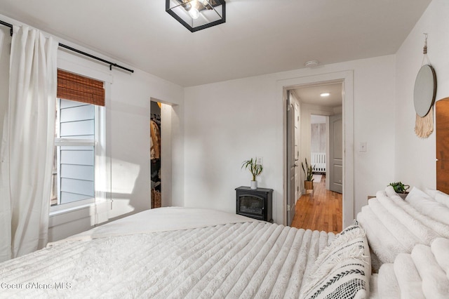 bedroom featuring wood-type flooring