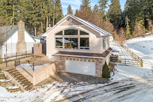 view of front of home with a garage