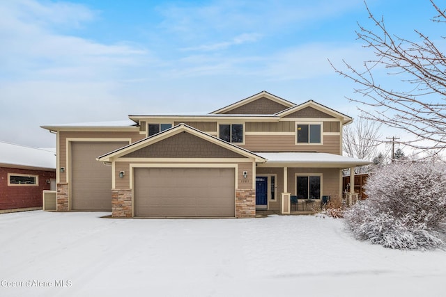 craftsman-style house with a garage and a porch