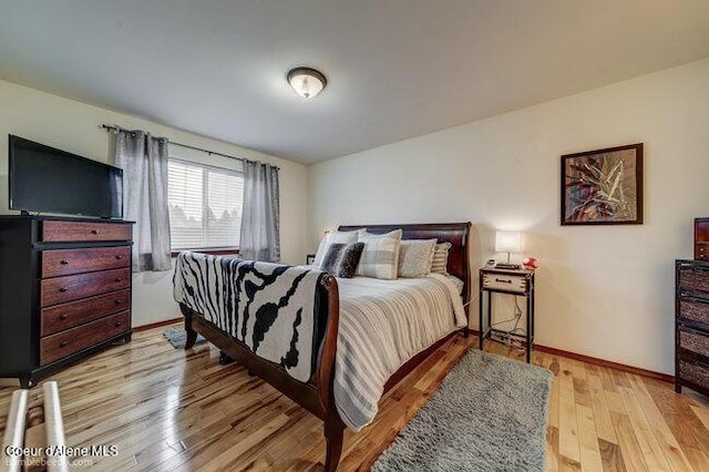 bedroom featuring light hardwood / wood-style floors