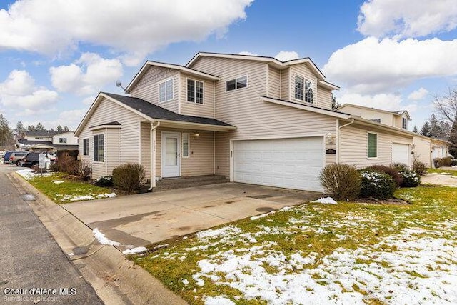 view of front of property featuring a garage