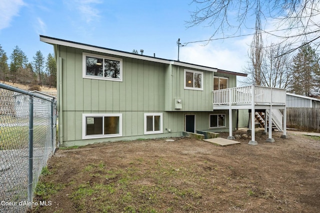 rear view of house with a deck