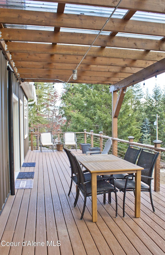 wooden terrace with a pergola