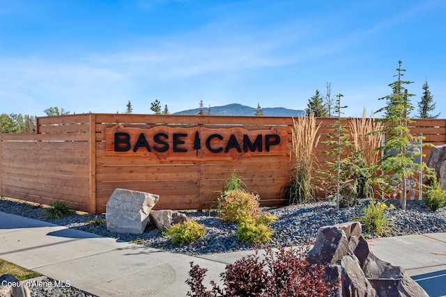 community sign featuring a mountain view