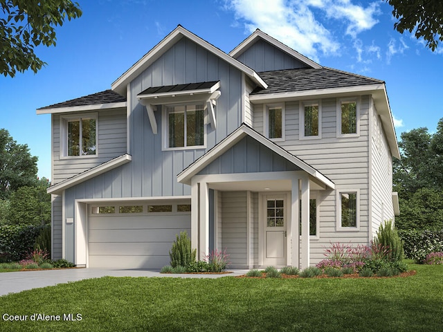 view of front of house with a garage and a front lawn