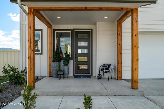 entrance to property featuring a garage