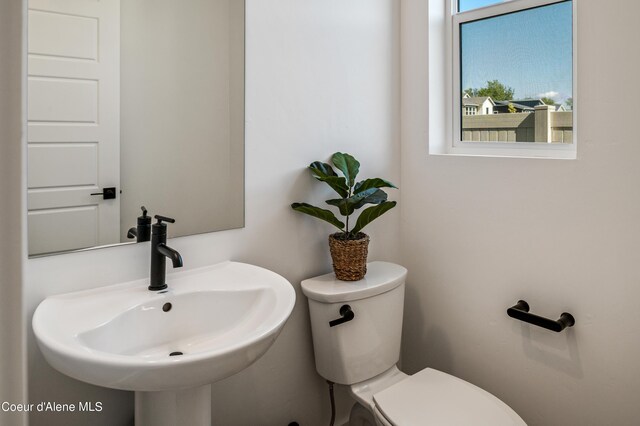 bathroom with toilet and sink