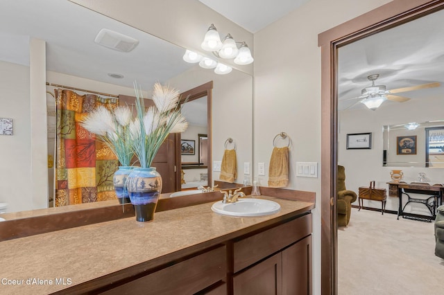 bathroom with vanity and ceiling fan