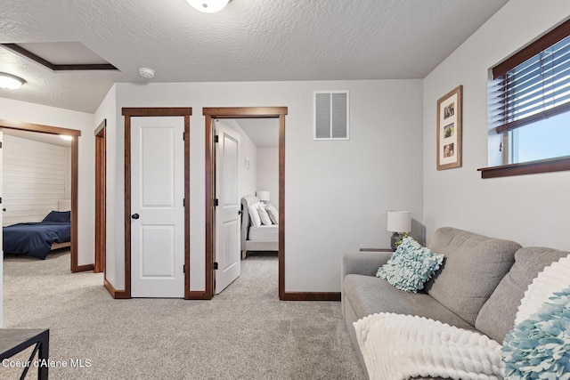 interior space featuring a textured ceiling