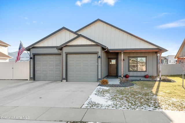 view of front of home with a garage and a front yard