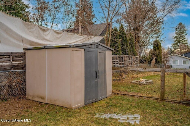 view of outbuilding featuring a lawn