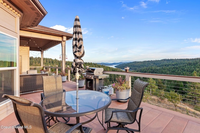 view of patio featuring a mountain view and a grill