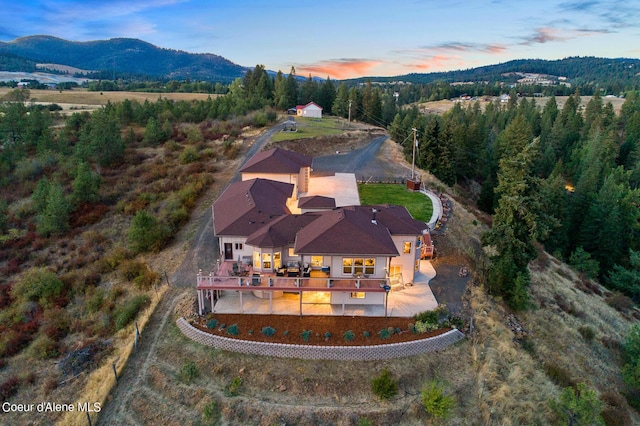 aerial view at dusk with a mountain view