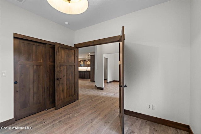 unfurnished bedroom featuring light hardwood / wood-style flooring