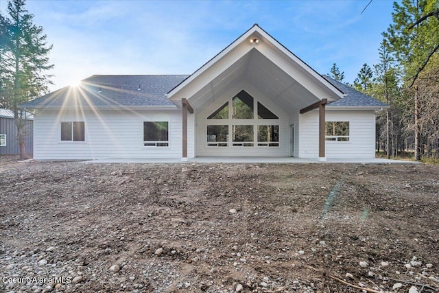 rear view of property with a patio area