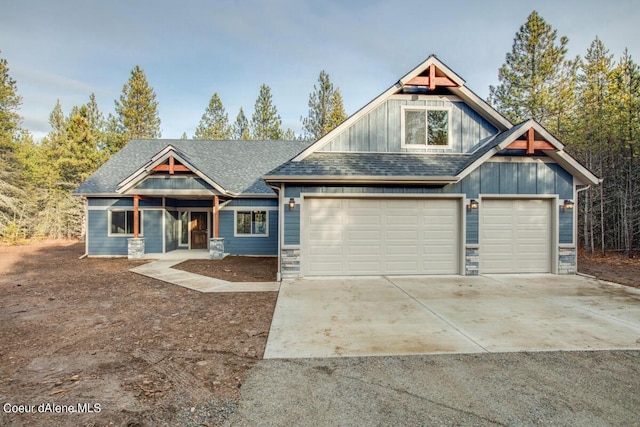 craftsman inspired home with a garage