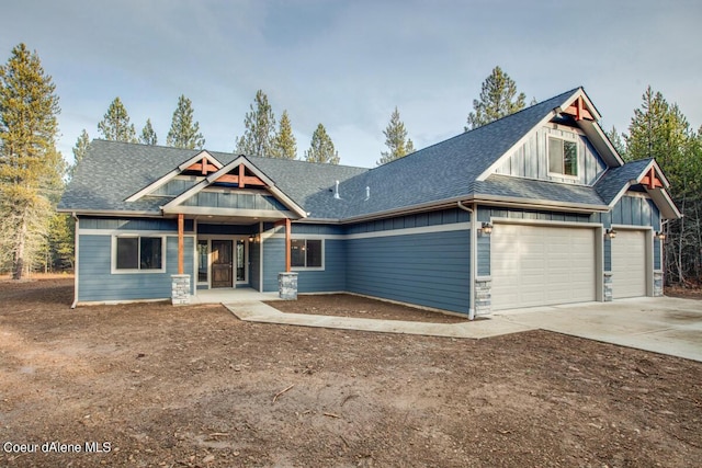 craftsman inspired home featuring a garage