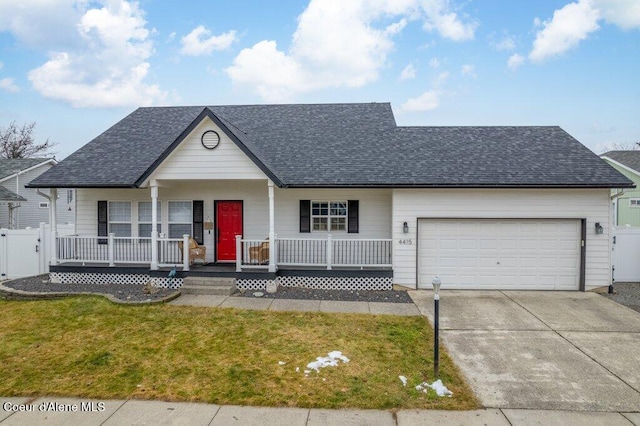 ranch-style home with a porch, a garage, and a front lawn