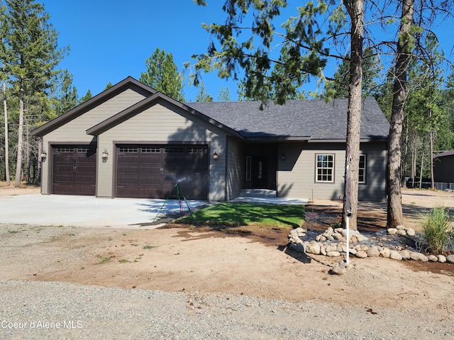 ranch-style home featuring a garage