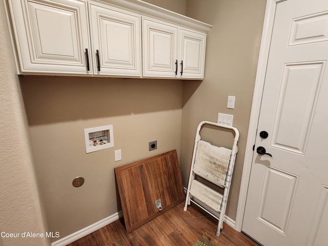 clothes washing area with washer hookup, cabinets, dark hardwood / wood-style flooring, and hookup for an electric dryer