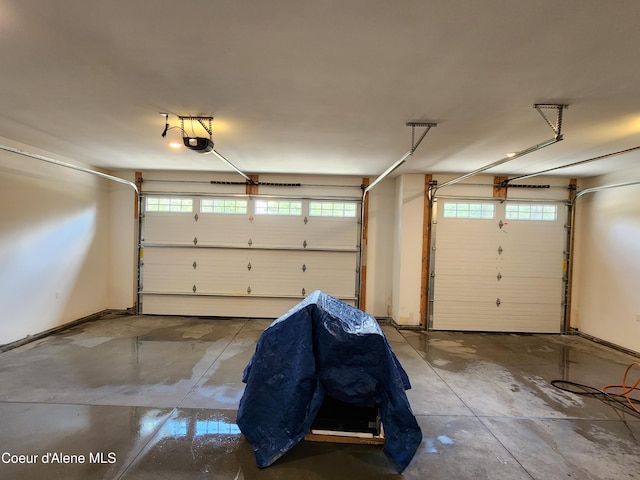 garage featuring a garage door opener