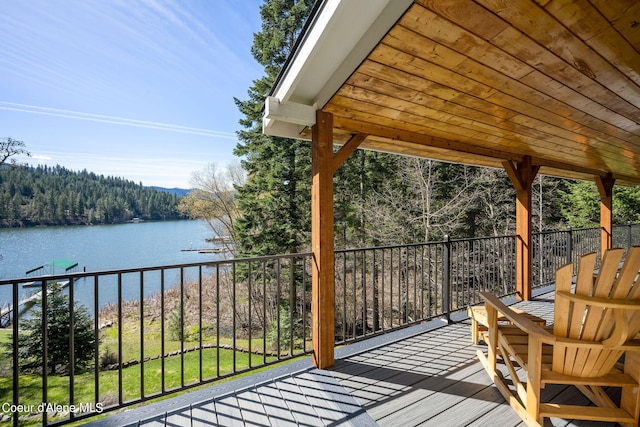 19503 E Hayden Lake Rd, Hayden, ID 83835 - wooden terrace with a water view and a forest view