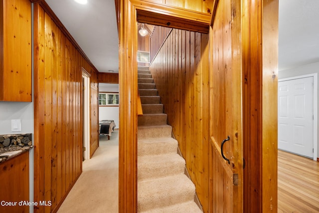 19503 E Hayden Lake Rd, Hayden, ID 83835 - stairs with wood walls and carpet