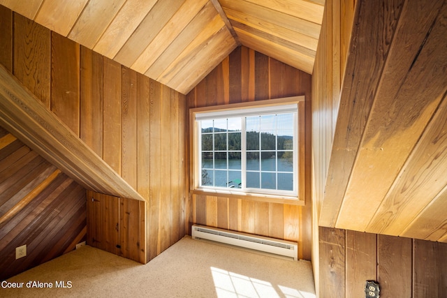 19503 E Hayden Lake Rd, Hayden, ID 83835 - additional living space with a baseboard radiator, carpet flooring, wooden walls, and vaulted ceiling
